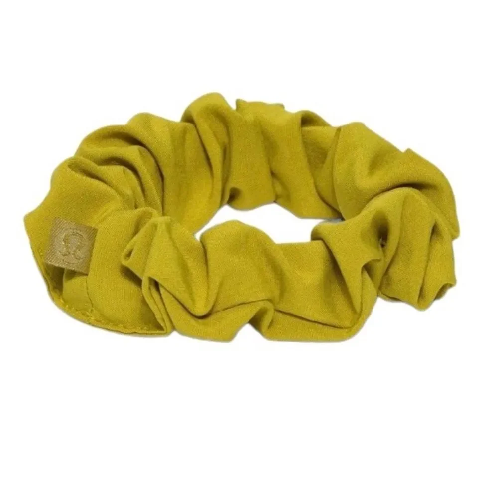 2 Lululemon Uplifting Scrunchies: Yellow Serpentine AND Golden Lime